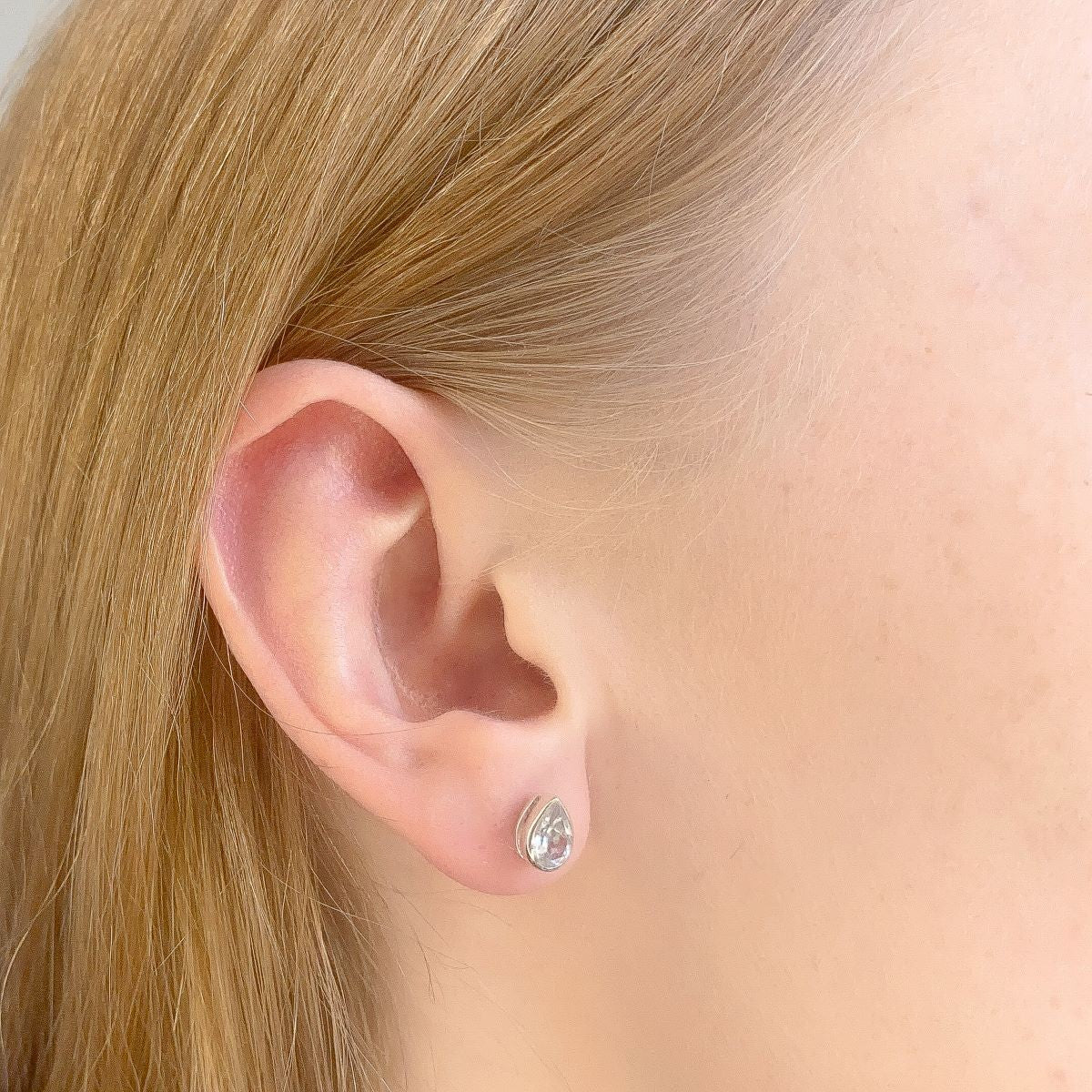 Sterling Silver Teardrop Blue Topaz Studs