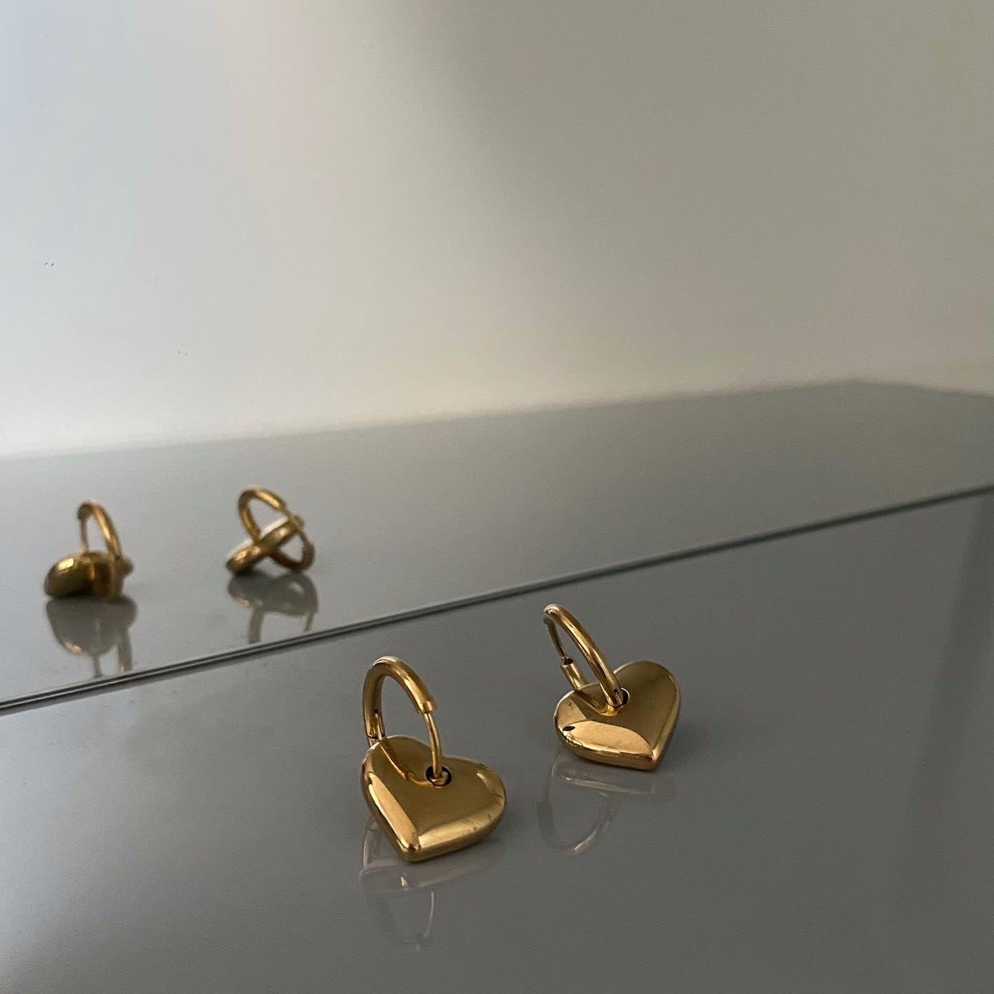 Auksuotos rinkutės su kabančia širdele