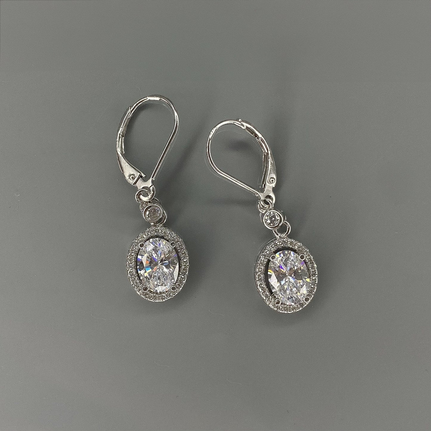 Sterling Silver Rhodium Plated Oval CZ Drop Earrings