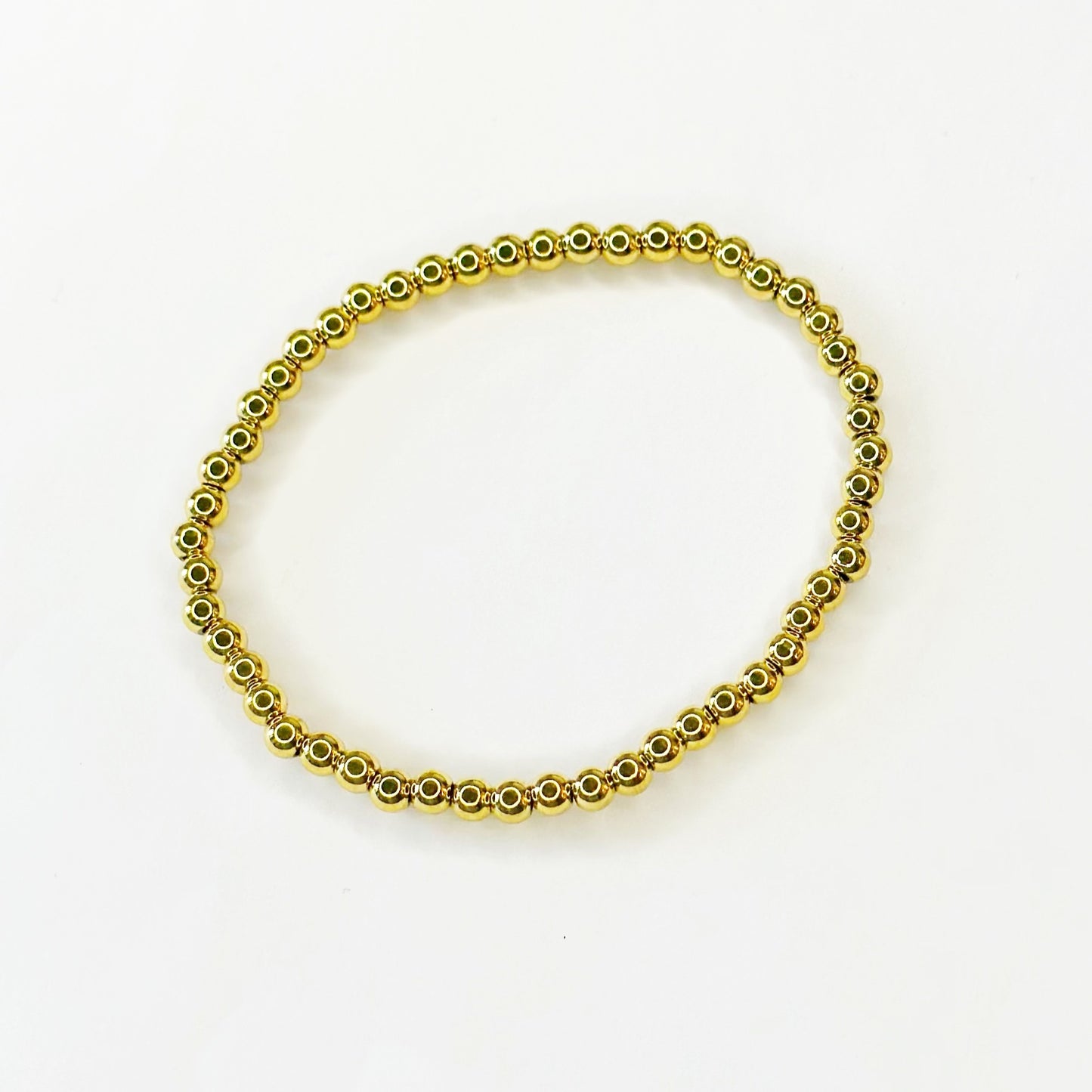 Auksuota apyrankė su burbuliukais