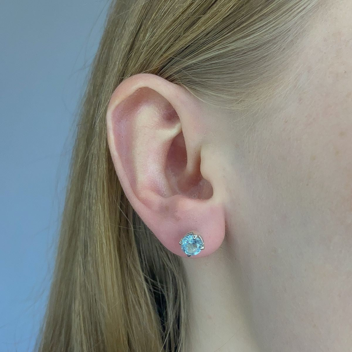 Sidabriniai auskarai su topazo kristalu