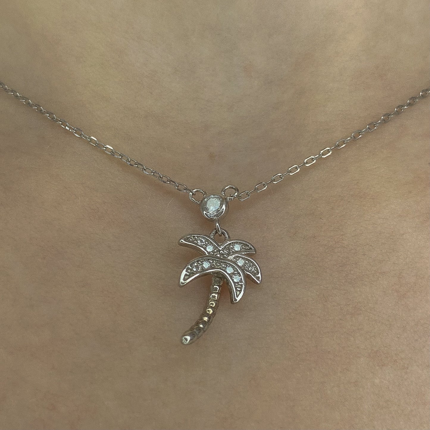 Sterling Silver Rhodium Plated CZ Palm Necklace