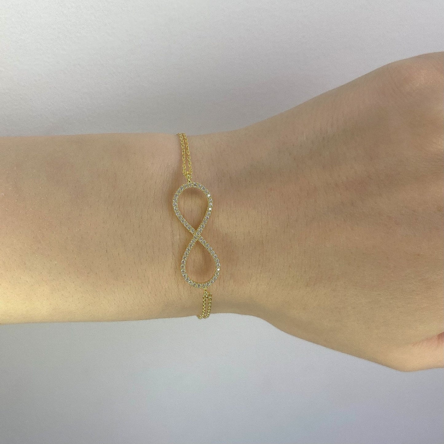 Sterling Silver Rhodium Plated CZ Infinity Bracelet