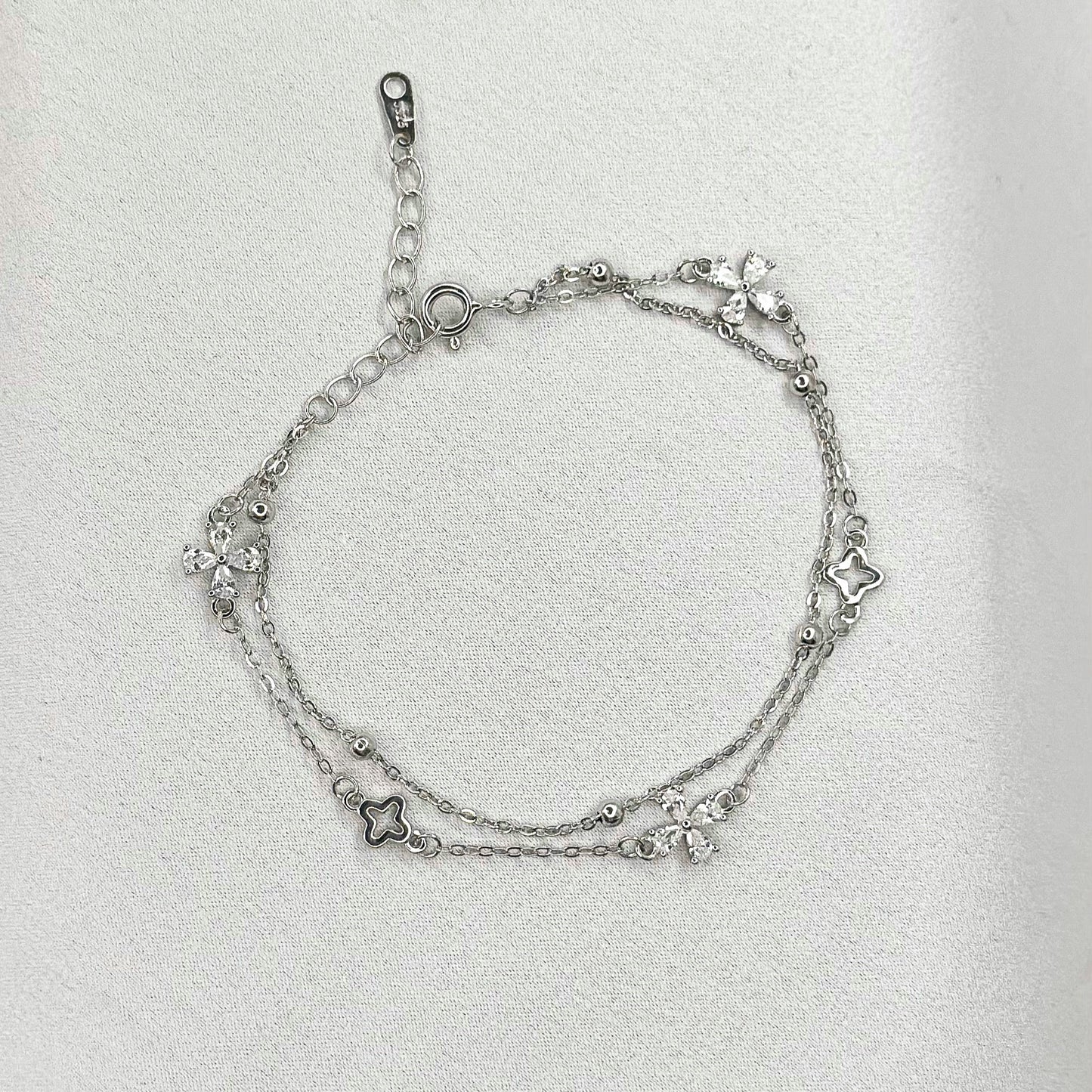 Sidabrinė rodžiuota dviejų gijų apyrankė su cirkoniais „Gėlytė ir dobilas“