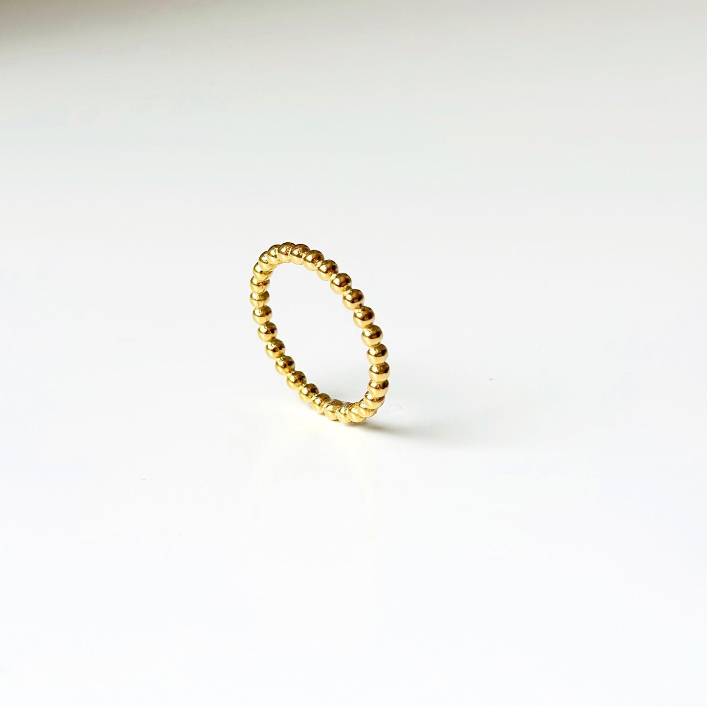 Auksuotas žiedas su mažais burbuliukais