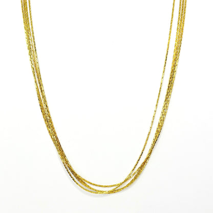 Auksuota keturių gijų koljė