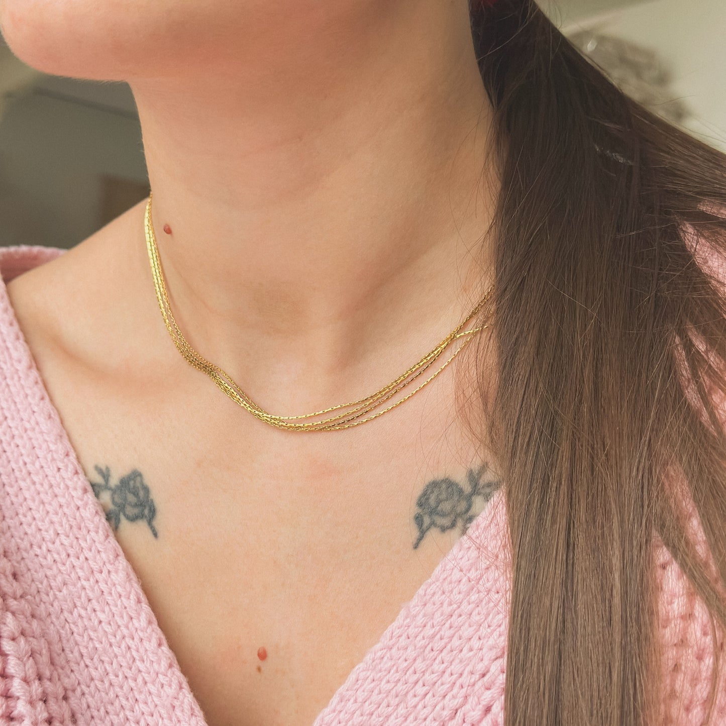 Auksuota keturių gijų koljė