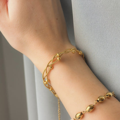 Auksuota sukta apyrankė su burbuliukais