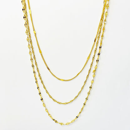 Auksuota triguba kolje su skirtingais pynimais