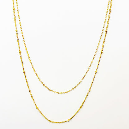 Auksuota dviguba grandinėlė burbuliukais