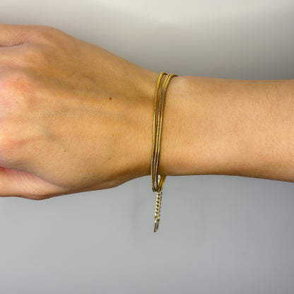 Auksuota trijų gijų apyrankė