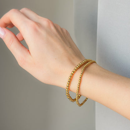 Auksuota apyrankė su burbuliukais