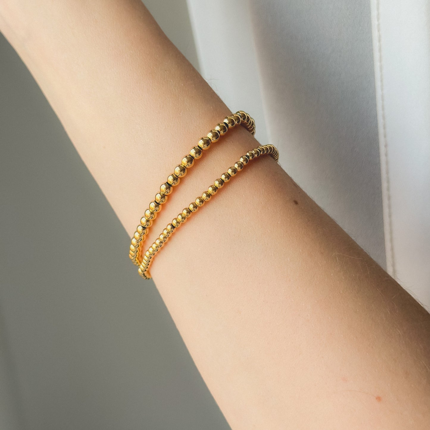 Auksuota apyrankė su burbuliukais