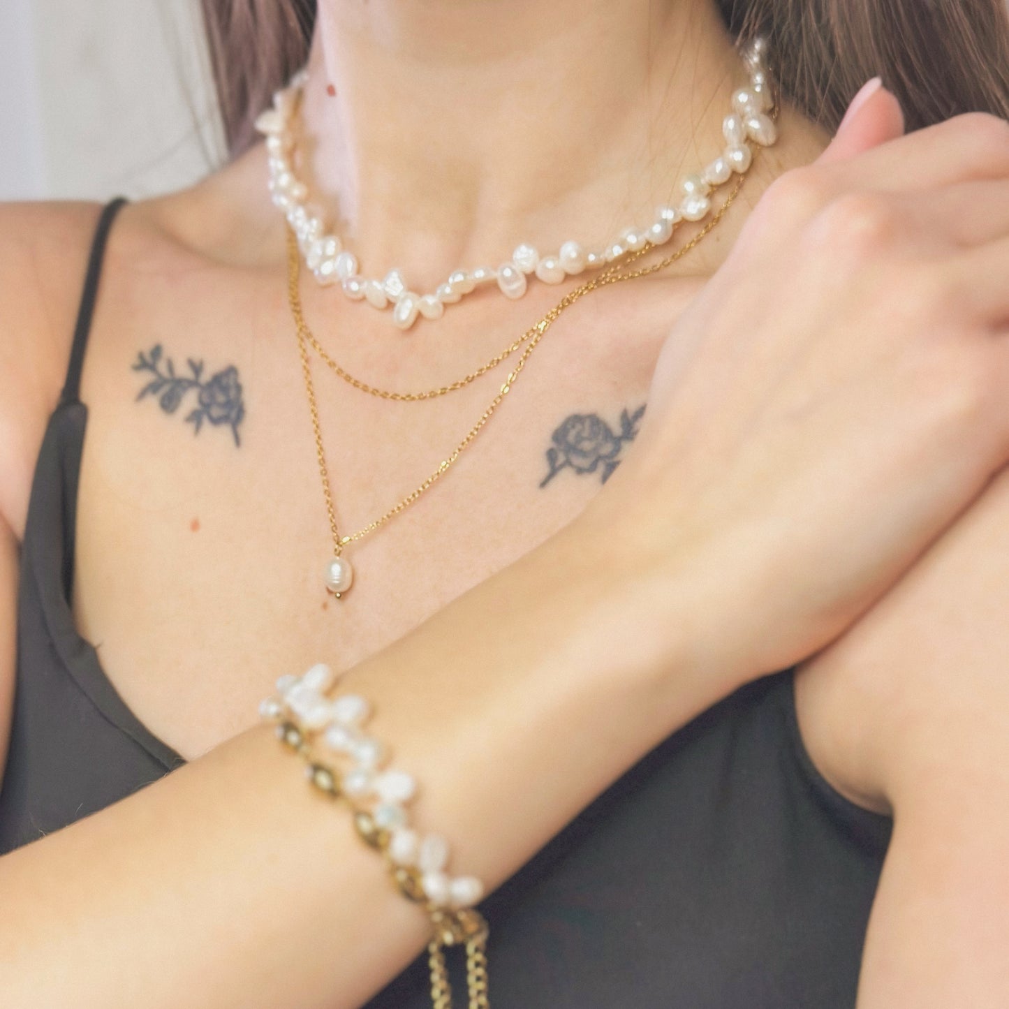 Auksuotas tikrų perlų vėrinys